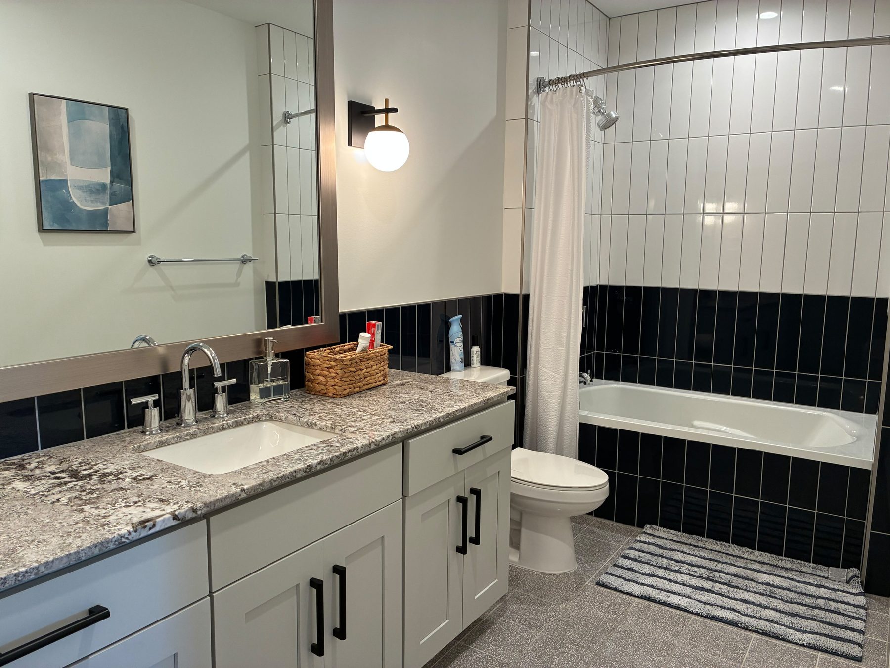 Bathroom after PureGlow cleaning, tidy counter and clean surfaces