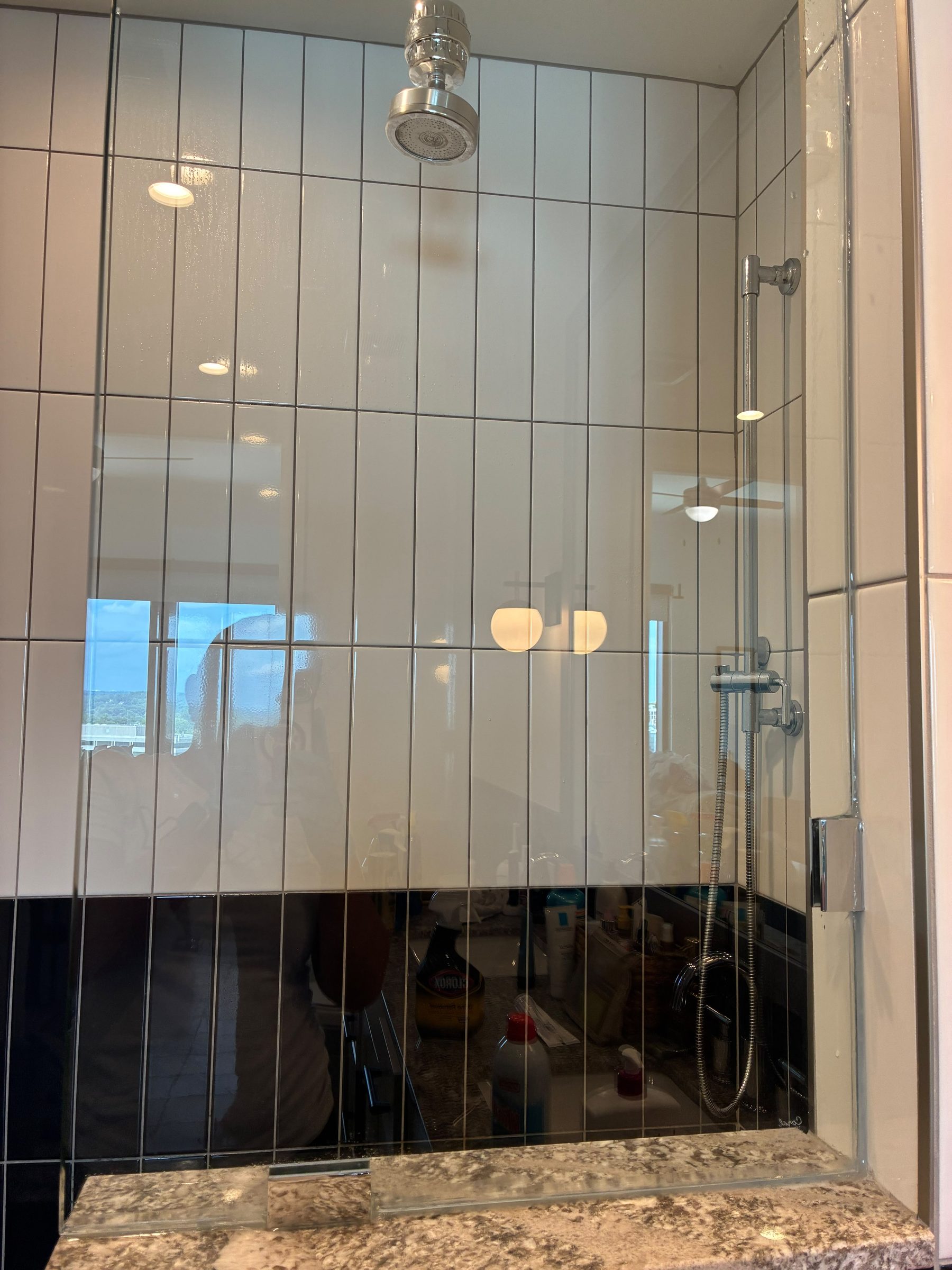 Streak-free glass shower after PureGlow cleaning